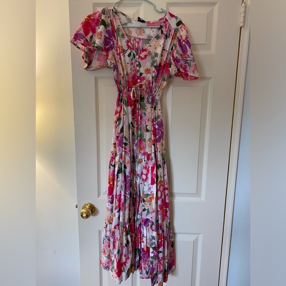 proud poppy Dresses & Skirts - Brand new floral dress with middle slit